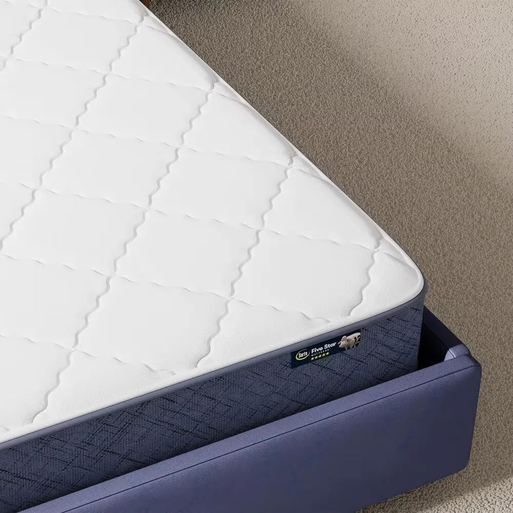 Close-up of Serta Perfect Day mattress corner showing high-quality stitching and firm edge support.
