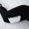 BEDGEAR Knee Pillow used as a leg spacer to relieve hip and lower back pain for side sleepers.
