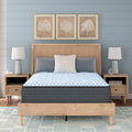 Front view of the 15-inch Destin Cove Mattress by Ashley styled in a bright, coastal-inspired master suite.
