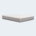High-angle perspective of the Terra Sleep 12-inch medium mattress illustrating the 12” supportive depth and premium textured grey side walls.
