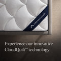 Top-down corner detail of the DreamCloud Classic mattress featuring the signature branded strap and innovative CloudQuilt technology fabric.