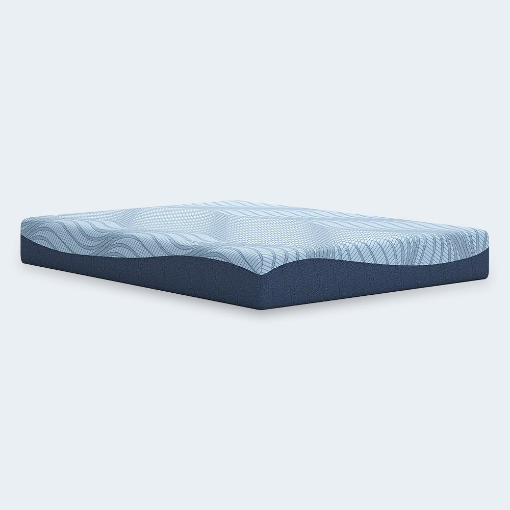 Side-angle studio view of the Ashley Furniture Peak 2.0 10-inch mattress highlighting the 10" supportive depth and durable navy blue border.
