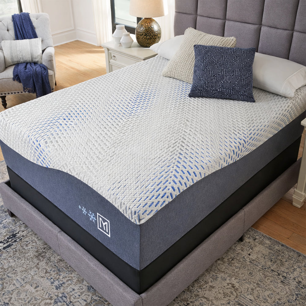 Frontal profile of the Millennium Luxury Gel Memory Foam Mattress on a raised power base, showing the mattress flexing for ergonomic sleep support.
