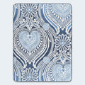 Overhead top-down view of the Luxe 2.0 Blue 15-inch mattress surface featuring a sophisticated blue and white heart damask pattern.
