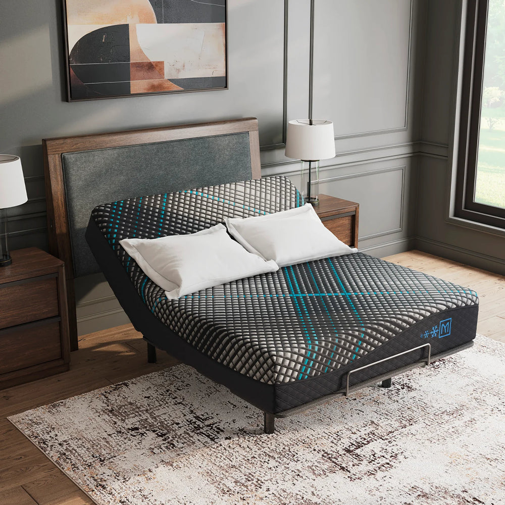 Contemporary luxury bedroom featuring the Ashley Millennium 2.0 cooling foam mattress elevated on a power bed frame.
