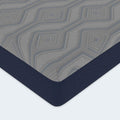 Detailed view of the grey diamond-patterned quilted top surface of the American Bedding Isotonic Percy mattress, designed for plush pressure relief.
