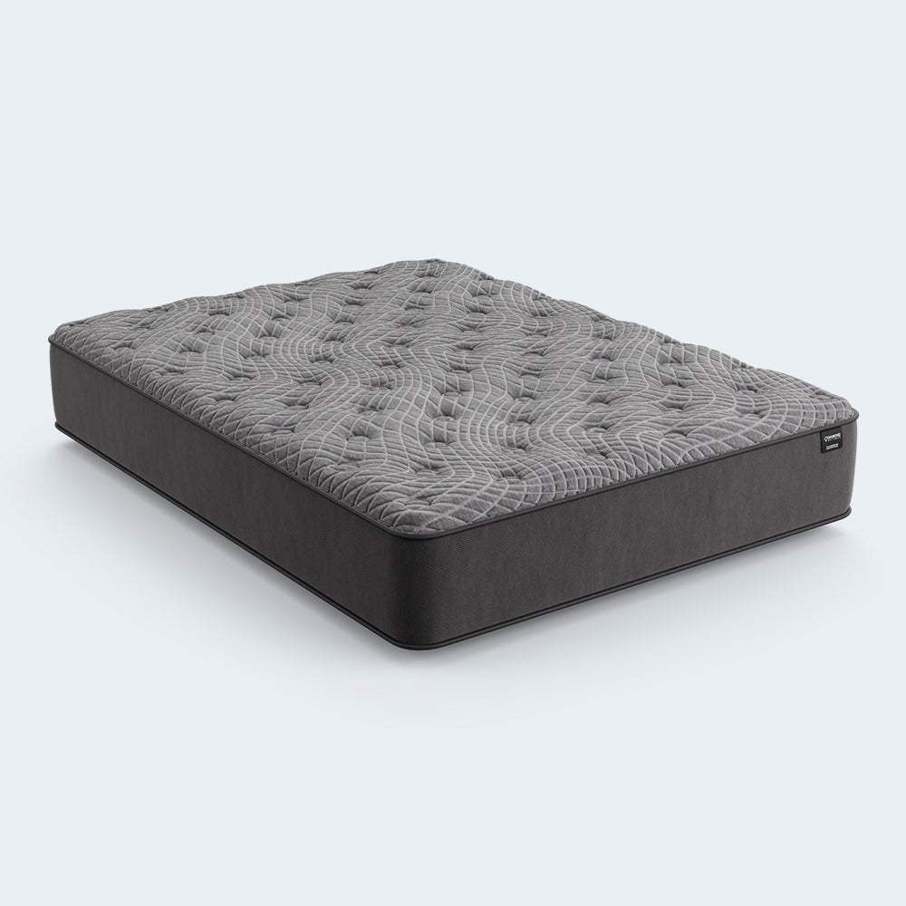Side view of the Dreamstage 2.0 Genuine Quilted Mattress highlighting the 12-inch profile and high-density foam support layers.
