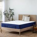 Perspective view of the Weekender 11-inch hybrid bed on a wooden frame, perfect for sleepers seeking medium firmness and supportive coils.
