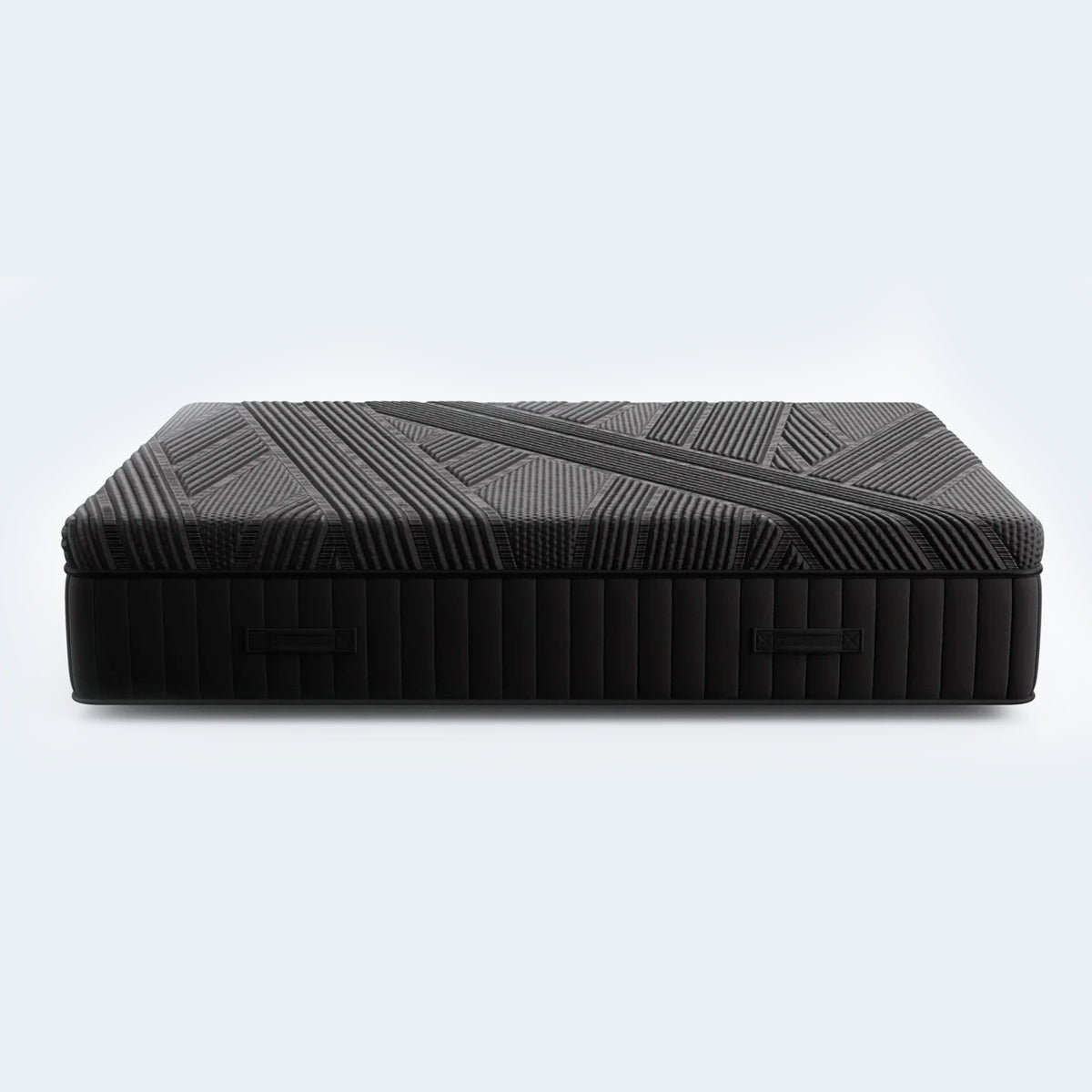  Side view of the Black Diamond Hybrid 15" Mattress highlighting the 15-inch height and handles.