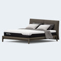 Angle view of the 10” Medium Memory Foam Latex Mattress on a stylish bed frame, showcasing the two-tone color design.