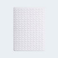 Top view of the BEDGEAR Dri-Tec Kids Mattress Protector showing the white textured moisture-wicking fabric surface.