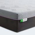 High-angle corner view of the Polaris 12" Aeroflex Hybrid Mattress showing the premium cooling fabric tag.