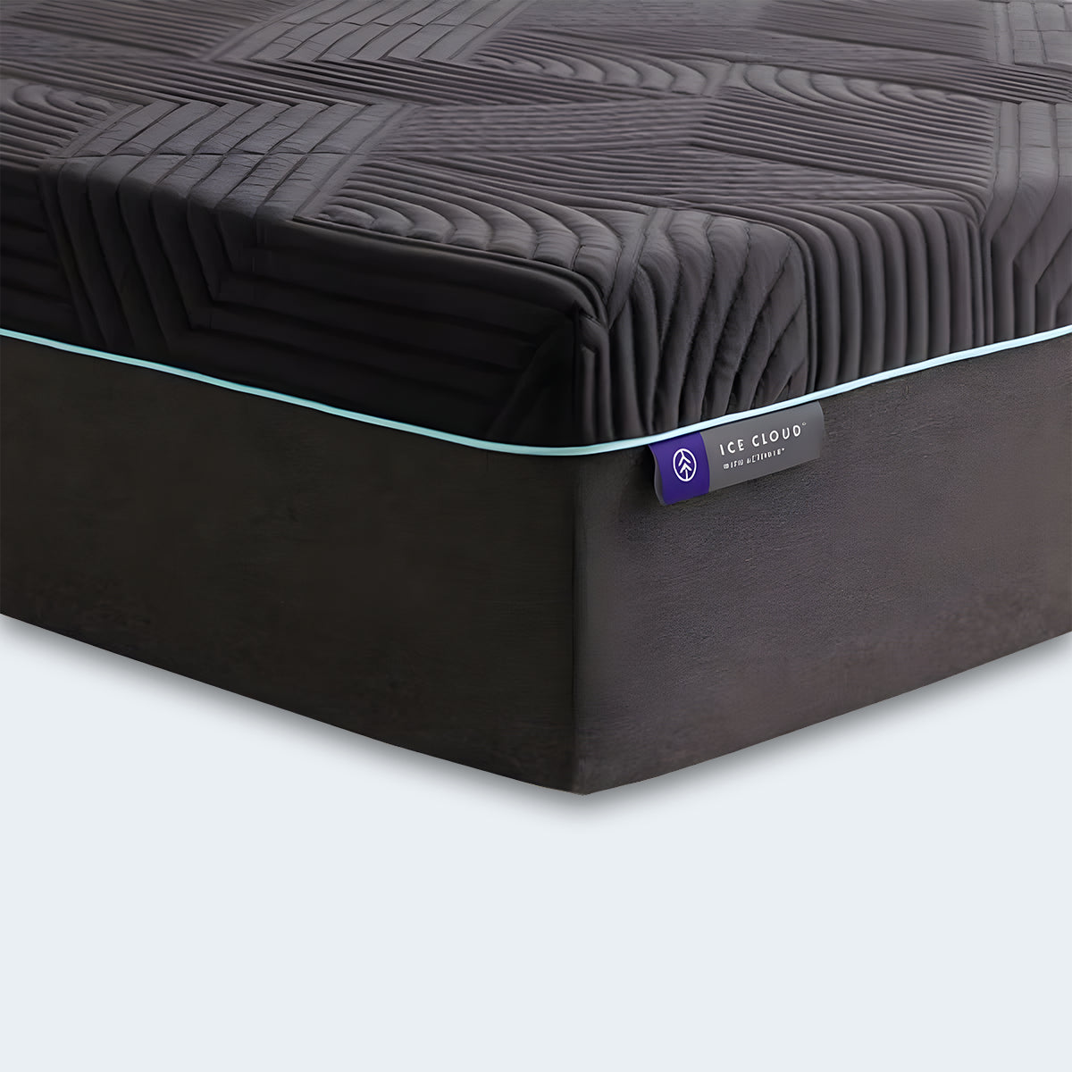 Close-up corner of the Ice Cloud 13" ActivAir Hybrid Mattress showing the purple logo tag and thick cooling fabric.
