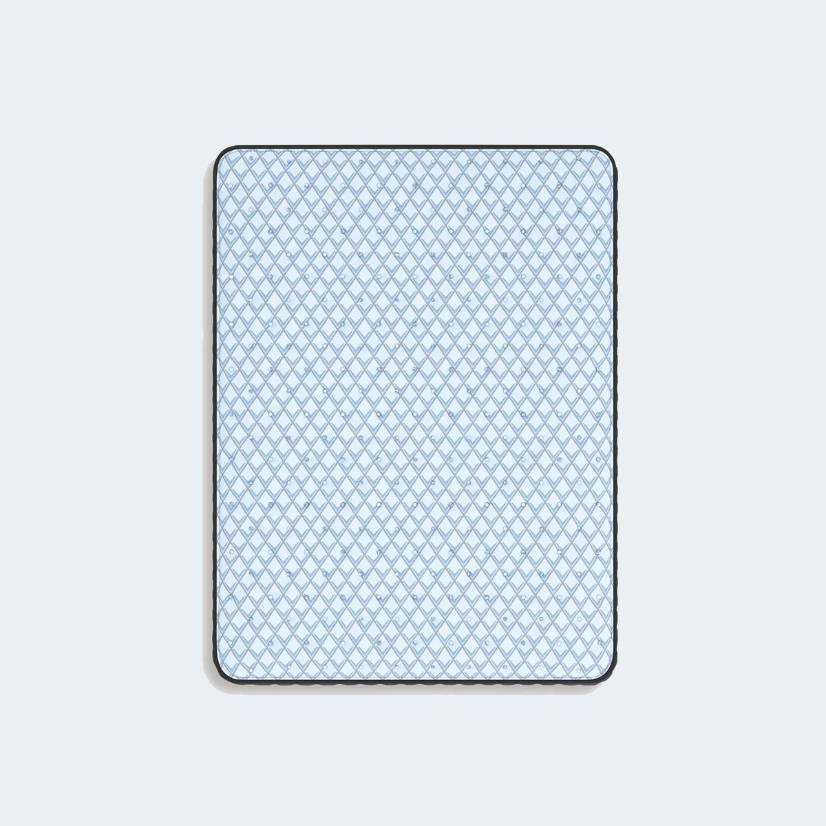 Top-down view of the Ashley Destin Cove mattress highlighting the breathable white and blue geometric diamond pattern on the luxury cover.

