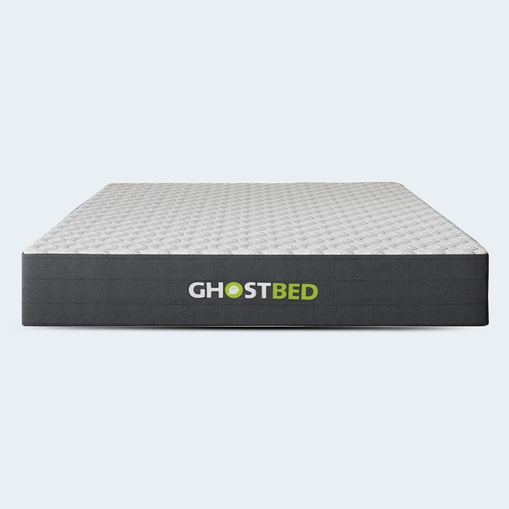 Front view of the isolated GhostBed 10-inch medium plush memory foam mattress with a white quilted top and charcoal grey sides.
