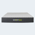 Front view of the isolated GhostBed 10-inch medium plush memory foam mattress with a white quilted top and charcoal grey sides.
