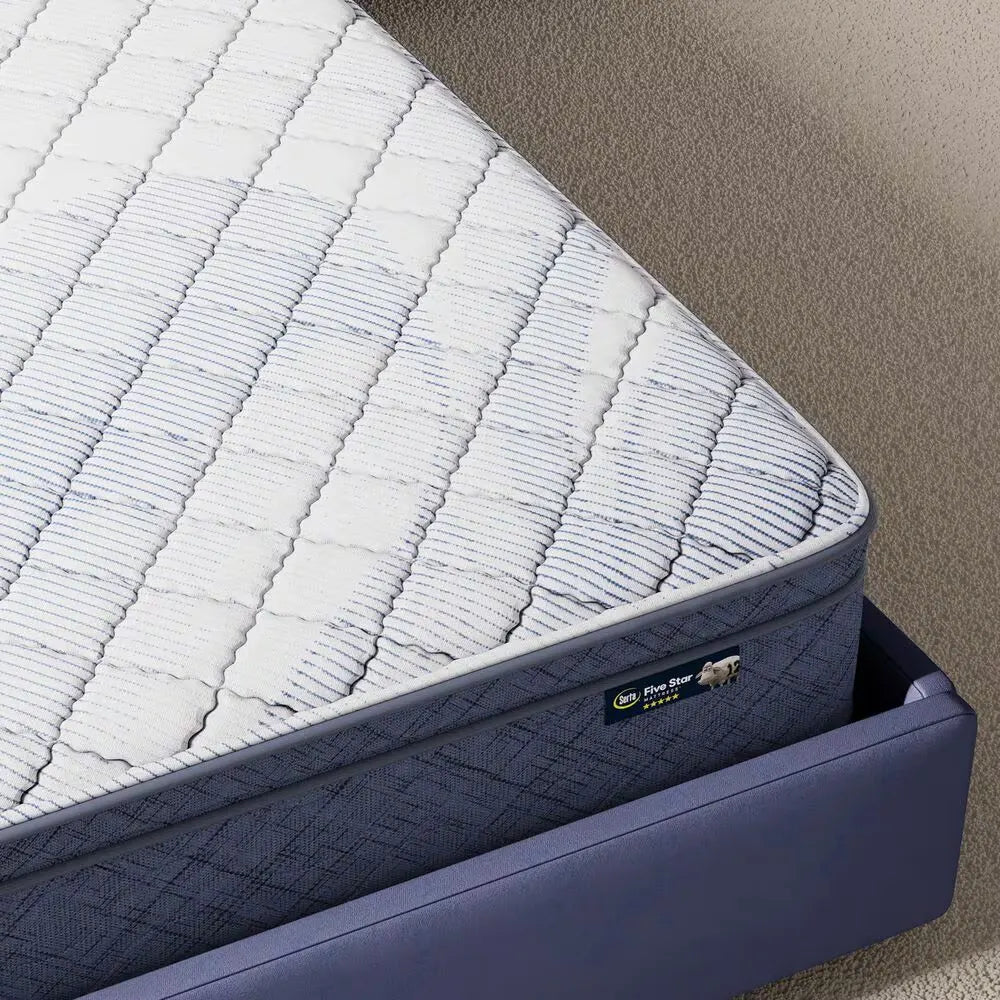 Durable quilted border and Serta logo on the 10 inch Plush Pillow Top Mattress for lasting support.
