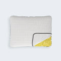 South Bay pillow with corner folded to reveal adjustable shredded memory foam for personalized sleep comfort.
