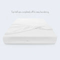 Malouf Encase 360 mattress protector with a zip-off top for easy laundering and machine washing.
