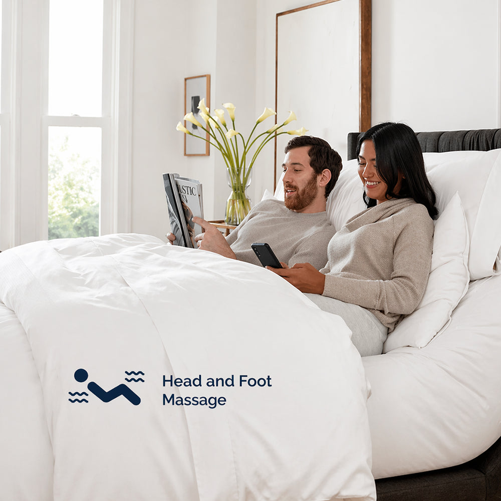 Couple relaxing on an S5000 adjustable bed base highlighting the head and foot massage feature for improved circulation and muscle recovery.
