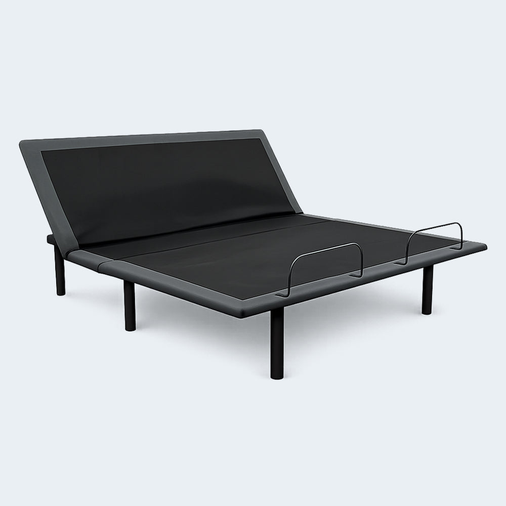 Three-quarter view of the Customatic Dreamsense Synergy adjustable base showing head elevation and mattress retainer bars.
