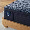 Detailed texture of Serta Perfect Sleeper Pro quilted hybrid mattress with supportive plush pillow top.
