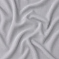 Macro texture of grey Hyper-Wool performance fabric designed for maximum airflow and soft comfort.
