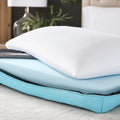 Cutaway view of Malouf Ice Cloud pillow layers showing cooling foam core and breathable Tencel blend cover.
