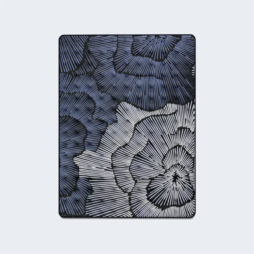 Detailed top view of the Serta Perfect Sleeper X Max Hybrid Mattress cooling fabric with a blue pattern.
