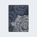 Detailed top view of the Serta Perfect Sleeper X Max Hybrid Mattress cooling fabric with a blue pattern.
