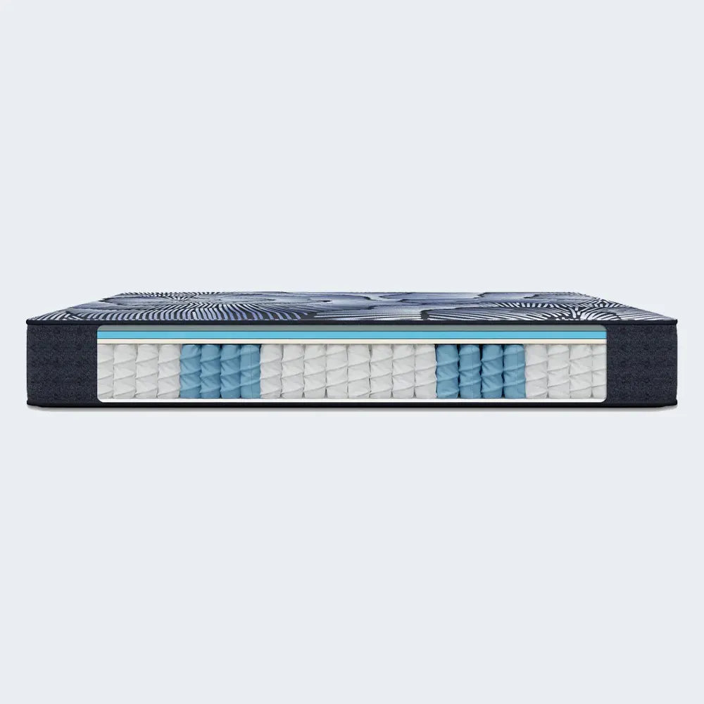Cutaway view of Serta Perfect Sleeper X Aspen Firm Mattress layers showing support coils and cooling foam.
