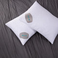 Top-down view of white BEDGEAR Dri-Tec pillow protectors featuring moisture-wicking fabric and Air-X tech.