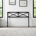 Versatile black metal X-design headboard by Weekender, shown in a bright and minimalist bedroom setting.

