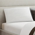 South Bay Essentials Memory Foam Pillow on a bed, providing ergonomic neck support and pressure relief.
