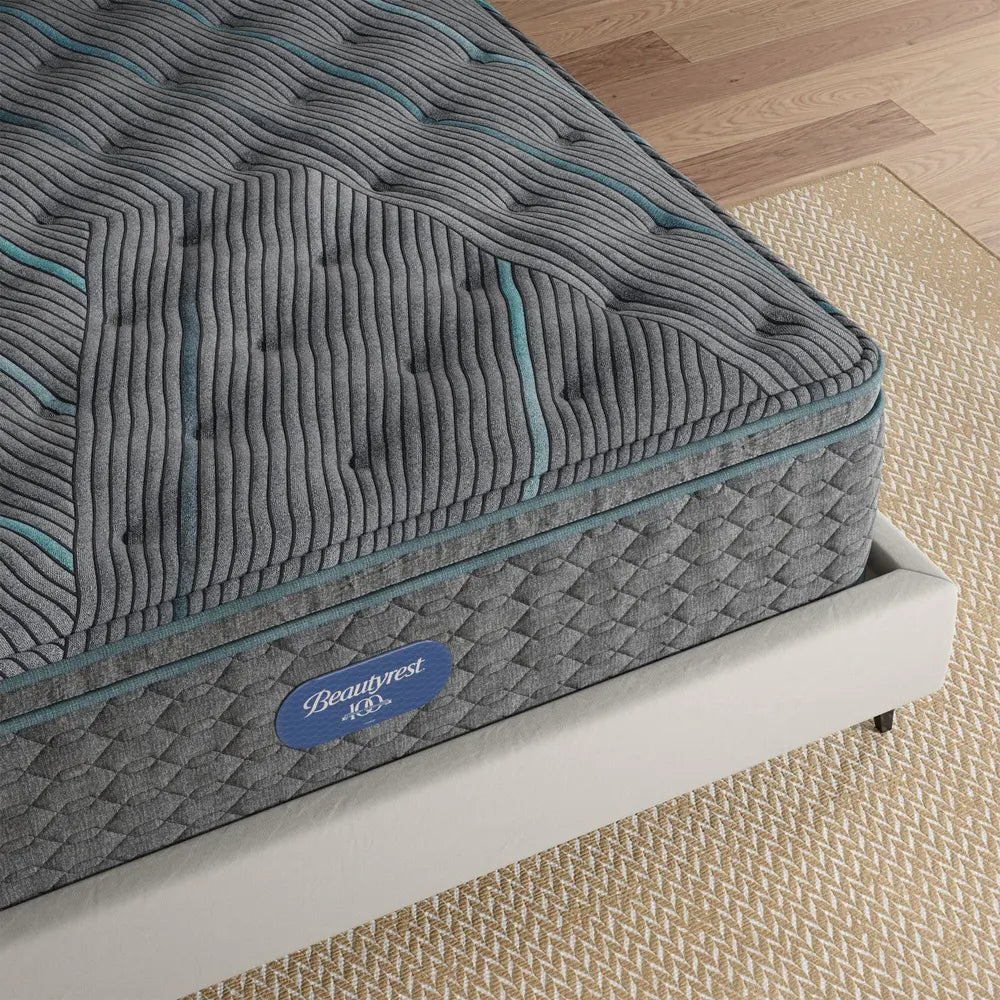 Close-up of Beautyrest Level Two mattress edge and plush pillow top surface for cooling, restorative sleep.
