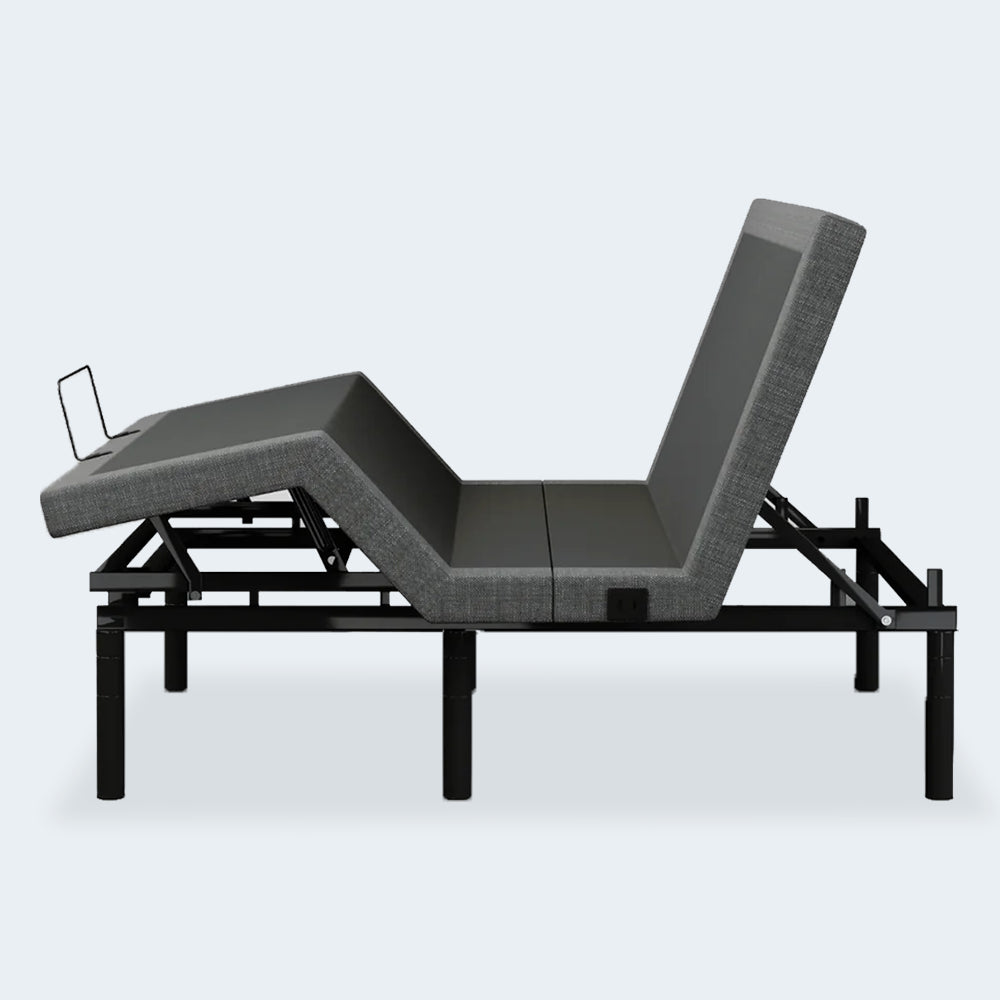 Side profile of the iDealBed Smart 4i adjustable bed with the head section fully elevated for reading, working, or watching TV in bed.
