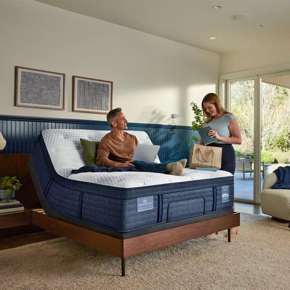 Serta iComfortPRO Dartmouth plush pillow top mattress on an adjustable bed base for customized comfort.
