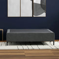 Low-profile Express Metal Foundation side view showing the sleek removable grey fabric cover design.
