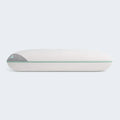 Side view of the BEDGEAR Rise Performance pillow highlighting the mint green piping and moisture-wicking cover.
