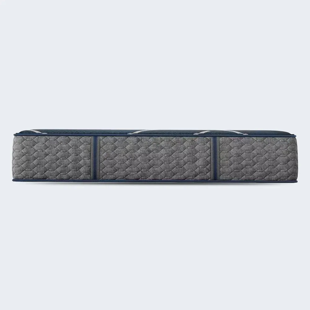 Side profile of the Beautyrest World Class Hybrid mattress highlighting the premium 13-inch depth and quilting.
