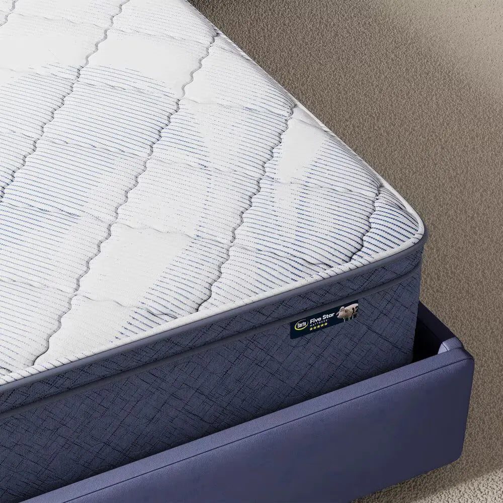 Serta Perfect Day 12" plush pillow top mattress providing luxury comfort in a modern bedroom setting.

