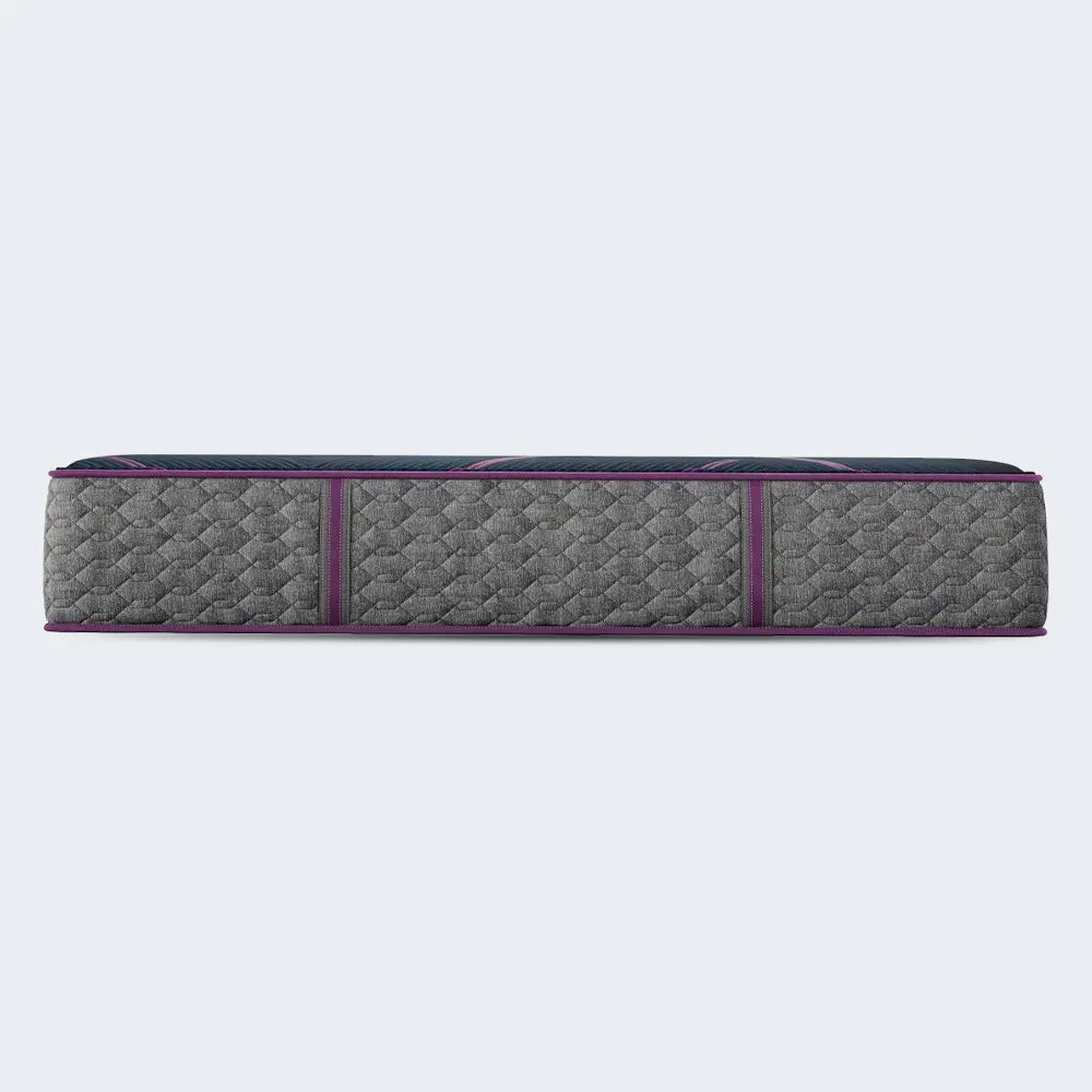 Angled view of the 13-inch Beautyrest World Class Hybrid Level Three Medium mattress with durable construction.
