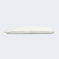 Side profile of the adjustable Luxury Resort Pillow showing customizable loft for all sleeping positions.
