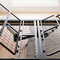 High-angle detail of the motor system and mechanical articulation components of the Malouf Structures N150 adjustable bed foundation.
