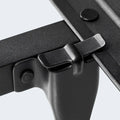 Close-up of the heavy-duty interlocking steel joints on a Malouf adjustable bed frame foundation.
