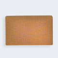 Top-down view of a perforated copper-infused foam pillow core for superior breathability.
