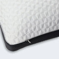 Close-up of the hidden zipper on a Sleeptone adjustable cooling pillow for easy loft customization.
