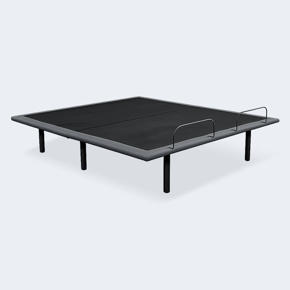 Customatic Dreamsense The Balance wireless adjustable bed base in a flat position showing the grey upholstered frame and mattress retainer bars.

