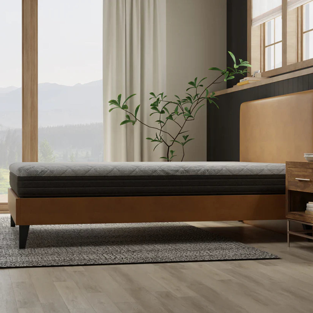 Low-profile side view of the Essentials 8-inch firm memory foam mattress by South Bay, demonstrating its sleek design and supportive foam layers.
