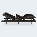 Side profile of the Comfort Ultra Adjustable Base by Ashley in a contoured lounging position for pressure relief and comfort.
